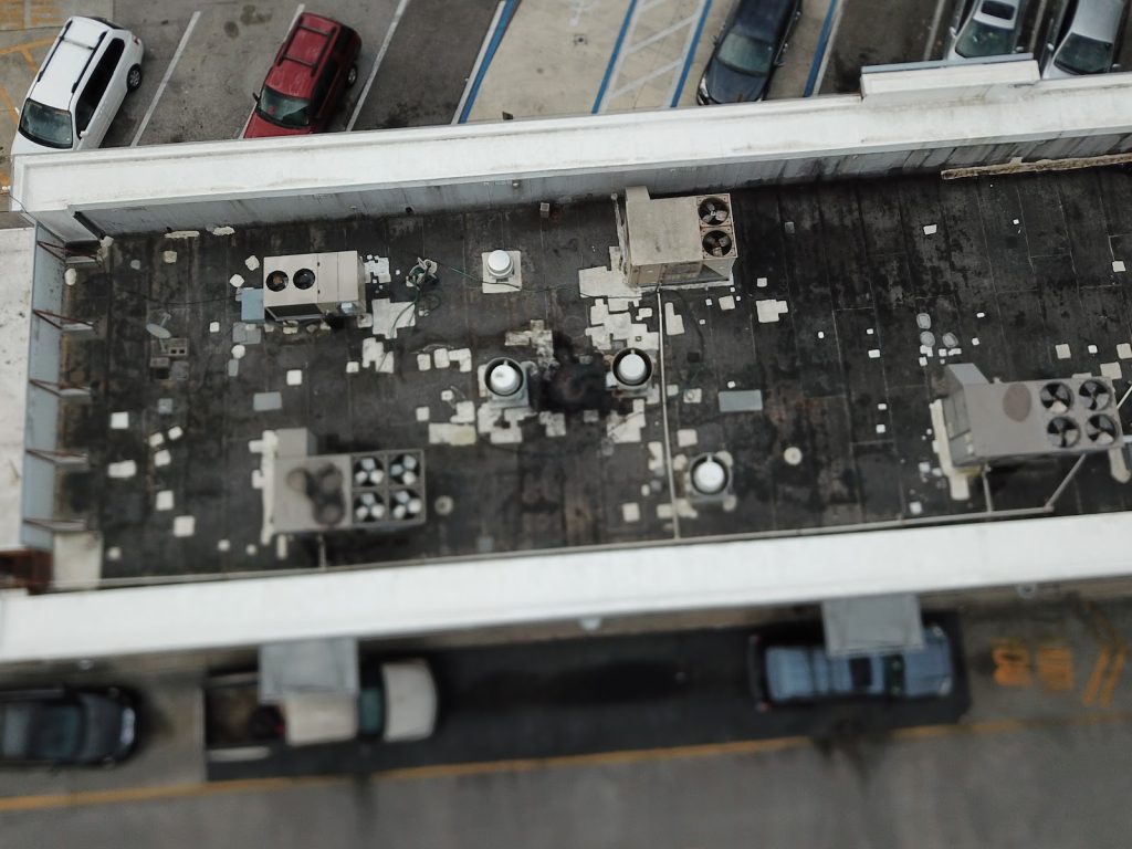 Commercial building flat roof before replacement